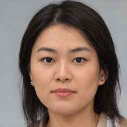 Neutral asian young-adult female with medium  brown hair and brown eyes