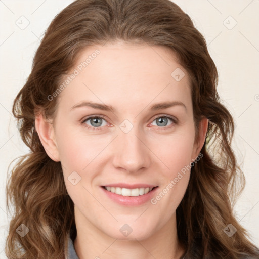 Joyful white young-adult female with long  brown hair and blue eyes