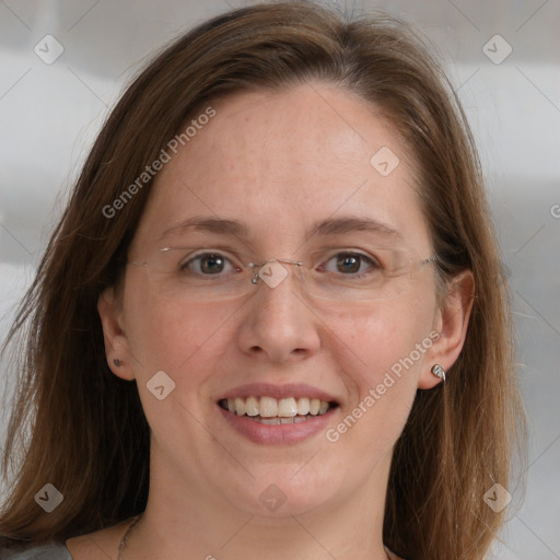 Joyful white adult female with medium  brown hair and blue eyes