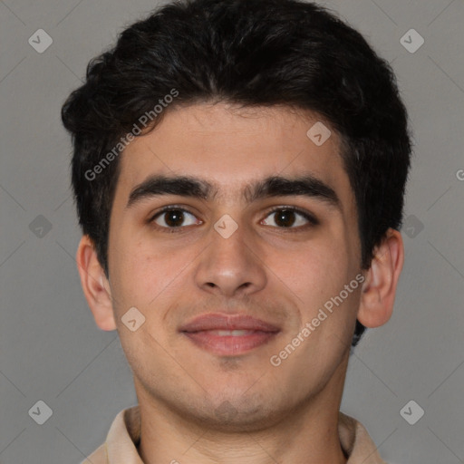 Joyful latino young-adult male with short  brown hair and brown eyes