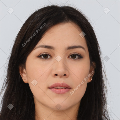 Joyful asian young-adult female with long  brown hair and brown eyes