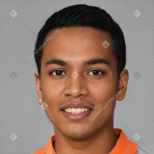 Joyful latino young-adult male with short  black hair and brown eyes