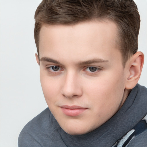 Neutral white child male with short  brown hair and grey eyes