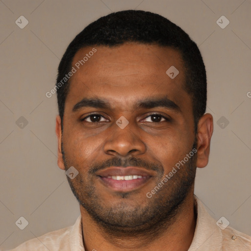 Joyful latino young-adult male with short  black hair and brown eyes