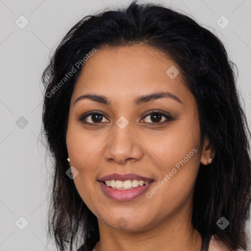 Joyful latino young-adult female with long  brown hair and brown eyes