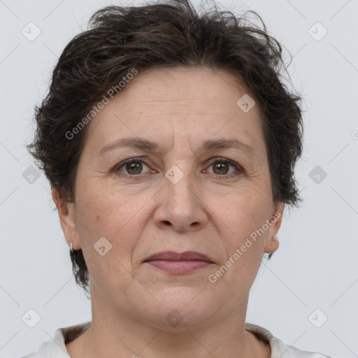 Joyful white adult female with short  brown hair and brown eyes