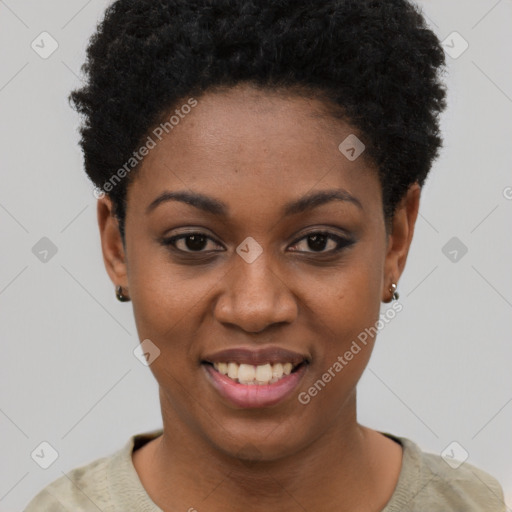 Joyful black young-adult female with short  black hair and brown eyes