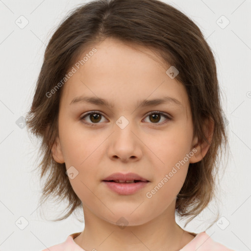 Joyful white child female with medium  brown hair and brown eyes