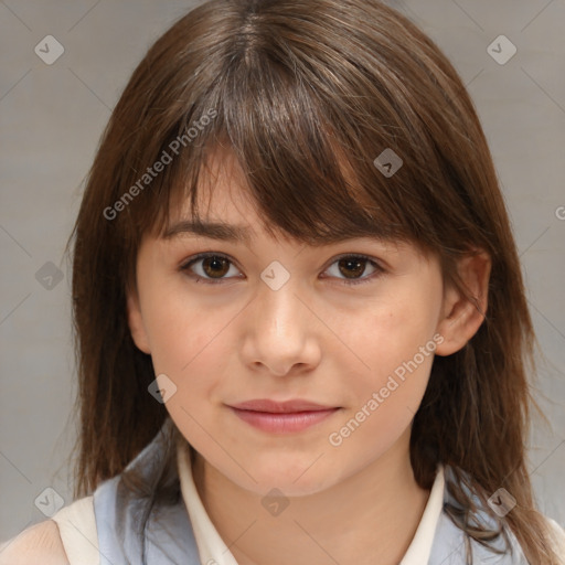 Joyful white child female with medium  brown hair and brown eyes