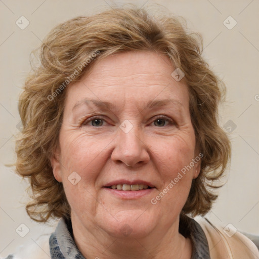 Joyful white adult female with medium  brown hair and blue eyes