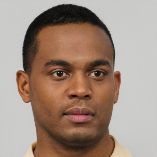 Neutral black young-adult male with short  black hair and brown eyes