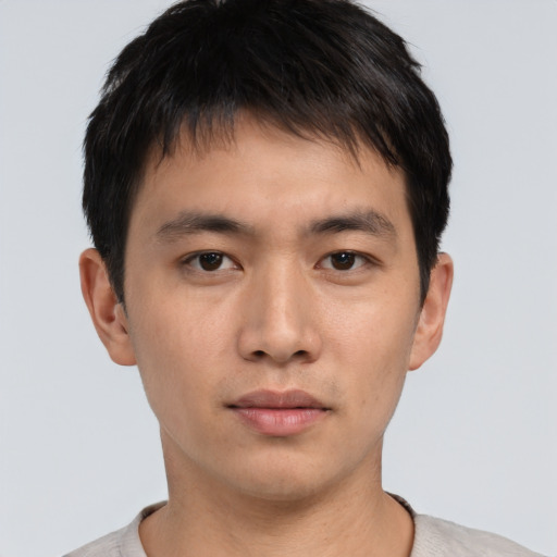 Neutral asian young-adult male with short  brown hair and brown eyes