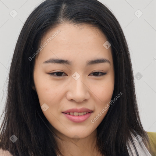 Joyful asian young-adult female with long  brown hair and brown eyes