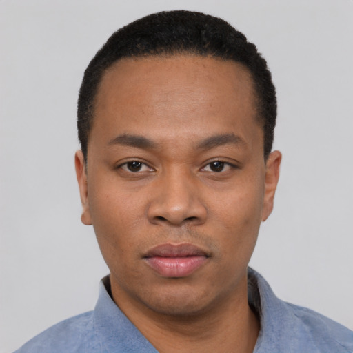Neutral black young-adult male with short  black hair and brown eyes