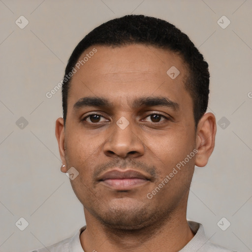 Neutral latino young-adult male with short  black hair and brown eyes