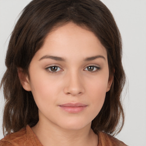 Neutral white young-adult female with medium  brown hair and brown eyes