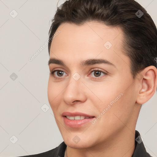 Joyful white young-adult female with short  brown hair and brown eyes