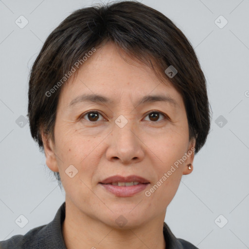 Joyful white adult female with short  brown hair and brown eyes