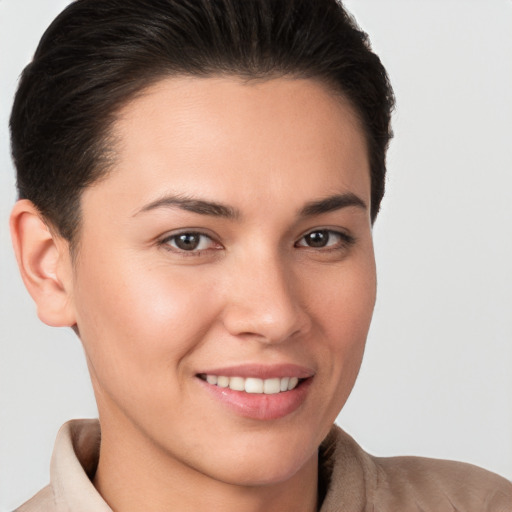 Joyful white young-adult female with short  brown hair and brown eyes