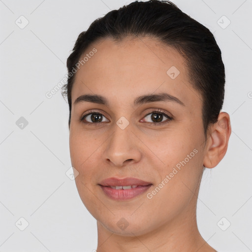 Joyful white young-adult female with short  brown hair and brown eyes