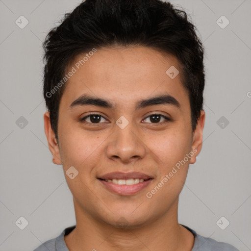 Joyful asian young-adult male with short  brown hair and brown eyes