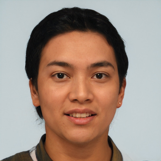 Joyful asian young-adult male with short  black hair and brown eyes