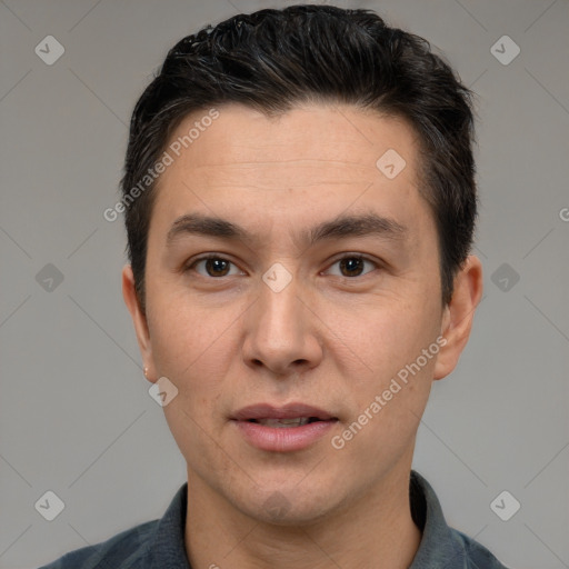 Joyful white adult male with short  brown hair and brown eyes