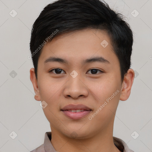 Joyful asian young-adult male with short  black hair and brown eyes