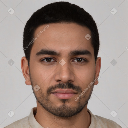 Neutral latino young-adult male with short  black hair and brown eyes