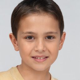 Joyful white child female with short  brown hair and brown eyes