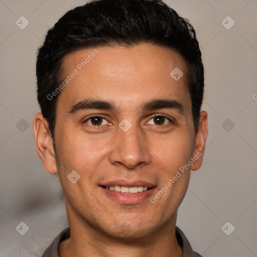 Joyful white young-adult male with short  black hair and brown eyes