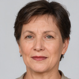 Joyful white middle-aged female with short  brown hair and brown eyes