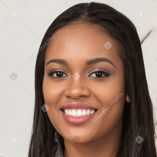 Joyful latino young-adult female with long  black hair and brown eyes