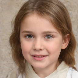 Joyful white child female with medium  brown hair and blue eyes