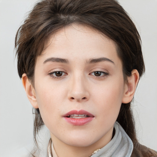 Neutral white young-adult female with medium  brown hair and brown eyes