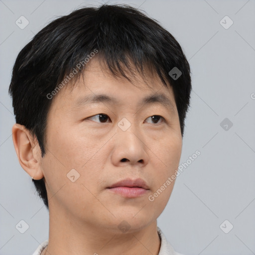 Neutral asian young-adult male with short  brown hair and brown eyes