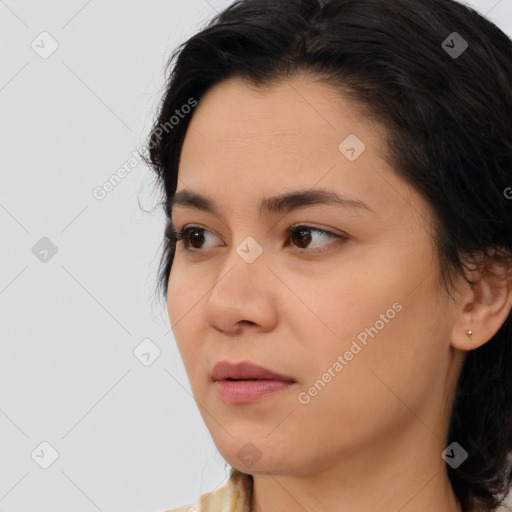 Neutral white young-adult female with medium  brown hair and brown eyes