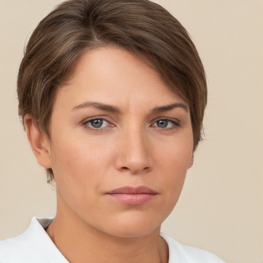 Neutral white young-adult female with short  brown hair and brown eyes