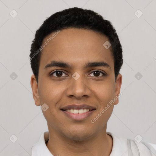 Joyful latino young-adult male with short  black hair and brown eyes