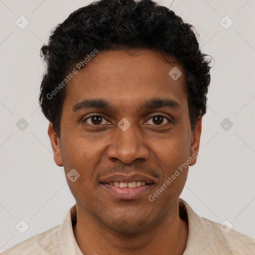 Joyful black young-adult male with short  brown hair and brown eyes