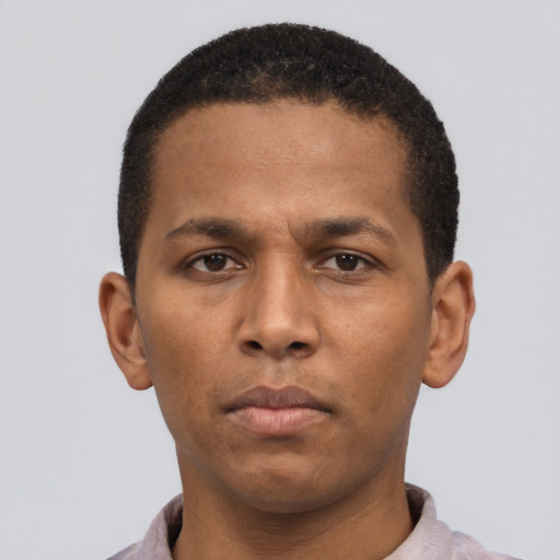 Neutral latino young-adult male with short  brown hair and brown eyes