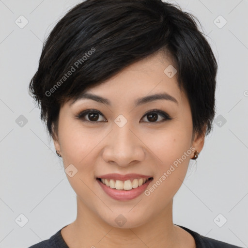 Joyful asian young-adult female with medium  black hair and brown eyes