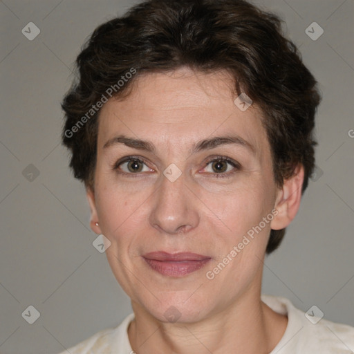 Joyful white adult female with short  brown hair and brown eyes