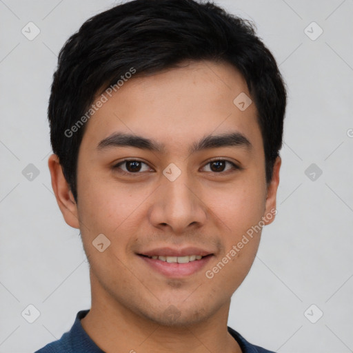 Joyful asian young-adult male with short  brown hair and brown eyes