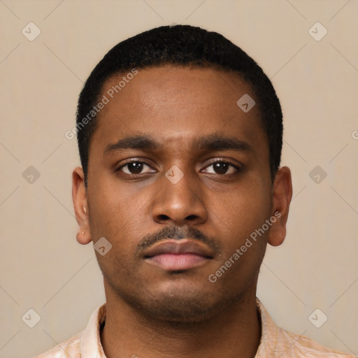 Neutral latino young-adult male with short  black hair and brown eyes