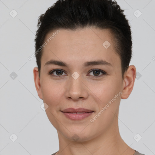 Joyful white young-adult female with short  brown hair and brown eyes