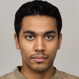 Neutral latino young-adult male with short  black hair and brown eyes