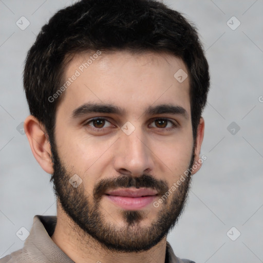 Joyful white young-adult male with short  black hair and brown eyes