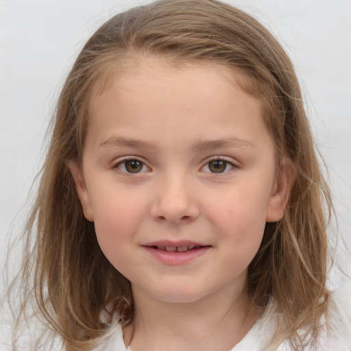 Joyful white child female with medium  brown hair and brown eyes