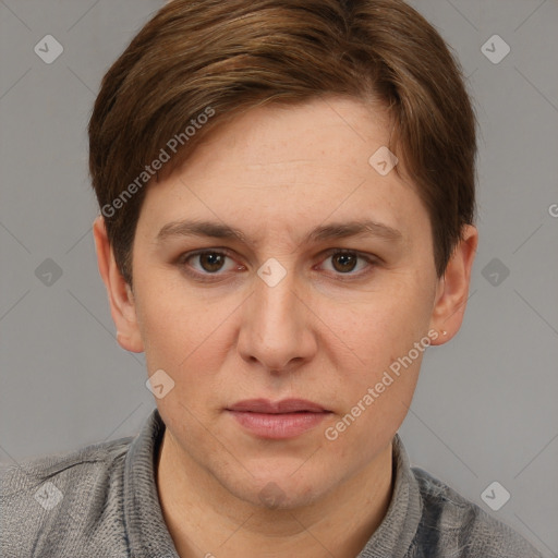 Joyful white adult female with short  brown hair and grey eyes